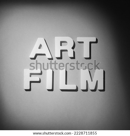 Art Film - Old movie title style text. Black and white photograph
