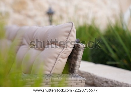 Close-Up,beige sofa in the yard and garden	
