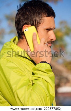 Man calling with a mobile smart phone  