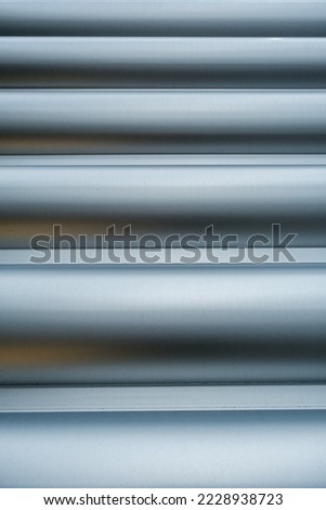 Epsom, Surrey, London UK, November 19 2022, Close Up Abstract Image Of Modern Steel Or Metal Security Door Showing Lines And Patterns With No People