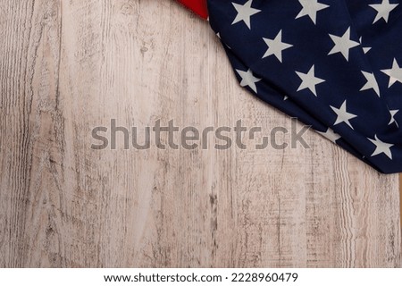 horizontal photo of united states flag stars in upper right corner on wooden background