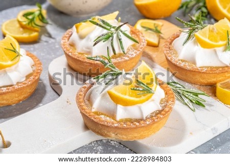 Christmas dessert,  Lemon rosemary tartlets, mini tart cakes copy space