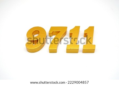   Number 9711 is made of gold-painted teak, 1 centimeter thick, placed on a white background to visualize it in 3D.                               