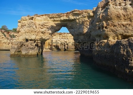 Algarve Portugal, arches and cliffs at the sea 