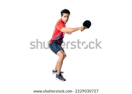 Portrait of sports man male  athlete playing table tennis isolated on white background. Royalty-Free Stock Photo #2229030727