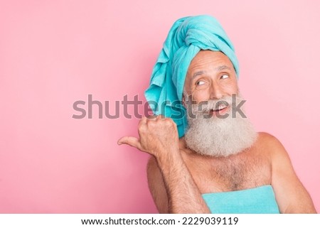 Portrait of senior grandfather point finger empty space advertise spa center sale isolated on pastel color background
