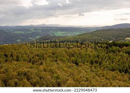 Forests in the national park Bohemian Switzerland with České Středohoří ( Czech Bohemian Highlands) from the Děčínský Sněžník, czech landscape