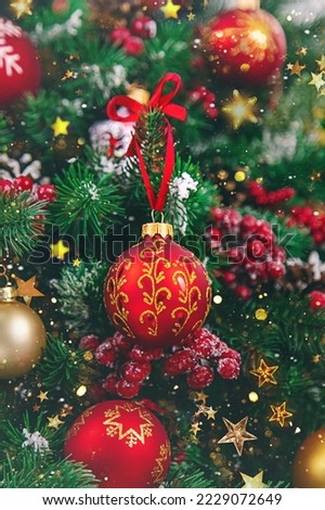Beautiful Christmas background with a Christmas tree. Selective focus. Holiday.