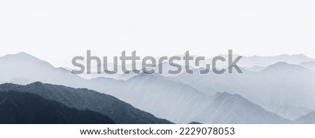 The texture background of the remote mountain scenery in Huangshan, China, looks like a long Chinese ink painting.