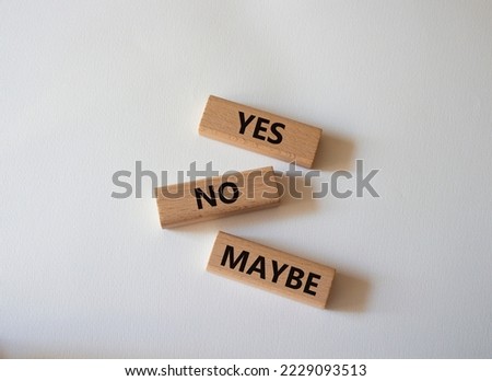Yes No Maybe symbol. Concept word Yes No Maybe on wooden blocks. Beautiful white background. Business and Yes No Maybe concept. Copy space.