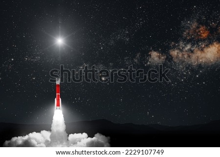 A rocket flies into space on Christmas Eve