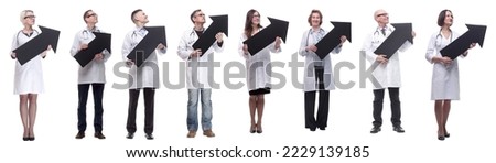 group of successful business people with black arrow
