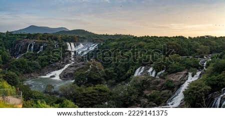 Waterfalls of Karnataka: Sunset over Shivasamudram Waterfalls including Barachukki and Gaganachukki waterfalls (Shivanasamudra waterfall) on Kaveri river near Mysore and Bangalore, Karnataka, India.