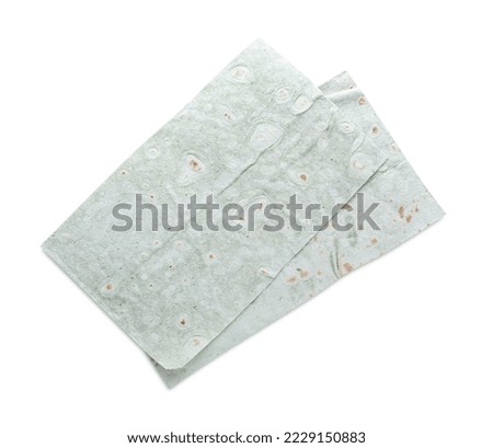 Delicious green folded Armenian lavash on white background, top view