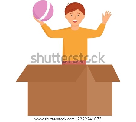 Happy boy jumping out of cardboard box and playing ball stands isolated on white. Child playing active games at home. Kid takes toys out of box and plays in new childrens room, fun childhood