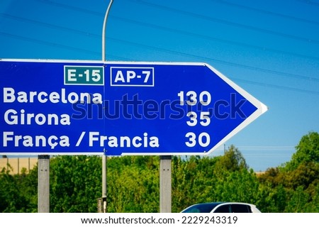 Barcelona road signs showing distances to Girona and France