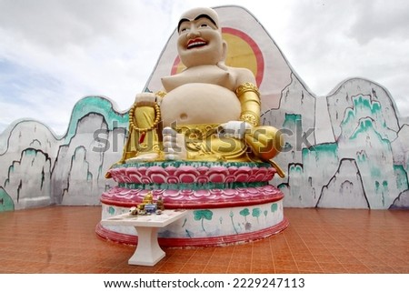 This is a Chinese Buddha statue.