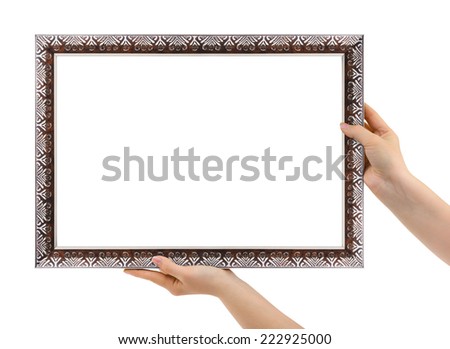 Metal frame in hands isolated on white background