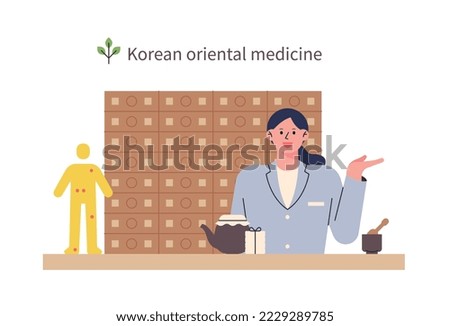 An oriental doctor is giving an explanation at the oriental clinic. She has a drawer with medicinal herbs behind her and a tool for making herbal medicines in front.