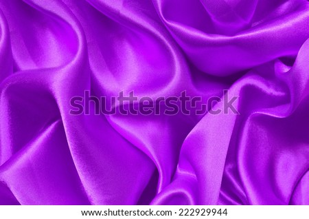purple Texture satin. silk background. shiny wavy pattern canvas. color fabric, cloth