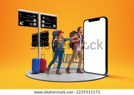 At airport. Happy young couple, smiling man and woman going to summer vacation trip using 3d model of phone isolated on orange background. New app, holiday, hobbies, travel, ad concept