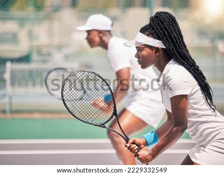 Tennis, team sport and black woman with partner on court for fitness, exercise and sport competition or game training for a club. Athlete girl and man outdoor for exercise, action and workout Royalty-Free Stock Photo #2229332549