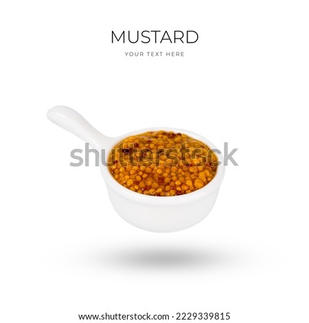 Wholegrain mustard in bowl isolated on white background. High quality photo