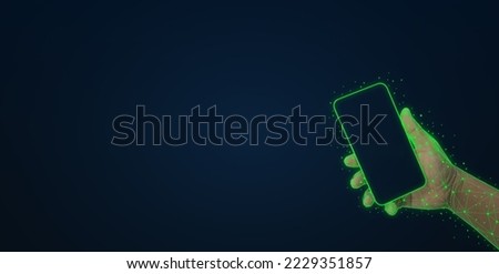Green connection line design on the hand of a man holding a mobile phone. concept of using modern technology in life functions, using mobile phones to control electrical equipment, also known as IoT.