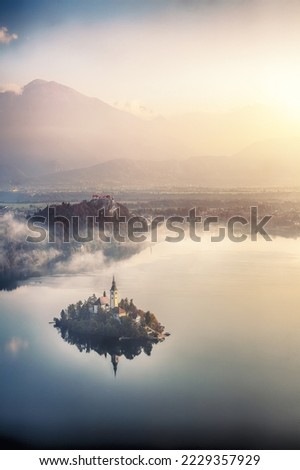 Fabulous sunrise over popular tourist destination  Bled lake. Dramatic view of Pilgrimage Church of the Assumption of Maria. Location: Bled, Upper Carniolan region, Slovenia, Europe Royalty-Free Stock Photo #2229357929