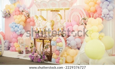 Decorate the birthday with presents, toys, balloons, garlands for a children's party Royalty-Free Stock Photo #2229376727
