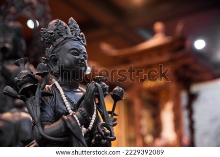 close-up of a Buddhist god statue. Chinese culture, Buddhism