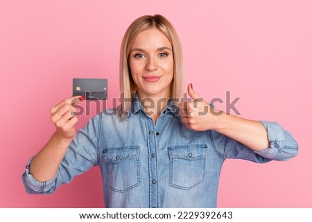 Portrait of pretty person hold banking card hand showing like symbol isolated on pastel color background.