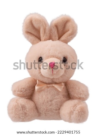 stuffed toy hare , fluffy rabbit with a bow, isolated Royalty-Free Stock Photo #2229401755