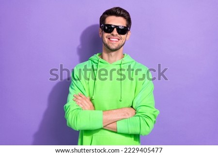 Photo of rich positive influencer hold folded hands wear green pullover expensive sunglasses rayban nightclub isolated on purple color background Royalty-Free Stock Photo #2229405477
