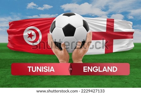 Tunisia vs England national teams soccer football match competition concept. Royalty-Free Stock Photo #2229427133