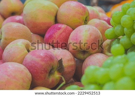 Apples on display in a store.