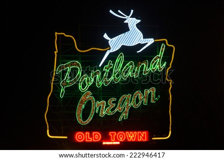 Sign in Portland, Oregon with jumping deer and image of oregon's borders Royalty-Free Stock Photo #222946417