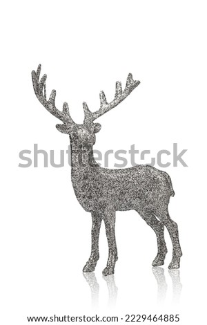 decorative deer figurine in sequins, christmas decoration, isolated