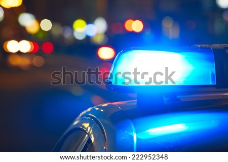Police car on the street at night Royalty-Free Stock Photo #222952348