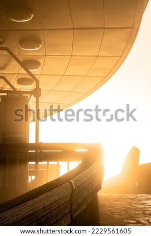 Sunrise on Ještěd in Liberec region. Rays of sunlight and beautiful Czech architecture. Czech Republic, Jested