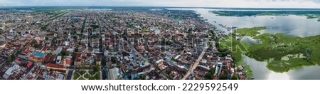 Panoramic drone photo of the Iquitos city and the Itaya river, Amazon, Loreto, Peru, South America 