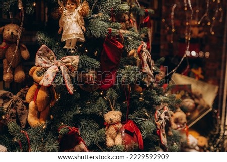 Happy New Year and Christmas concept. Cozy home interior with christmas tree and garlands