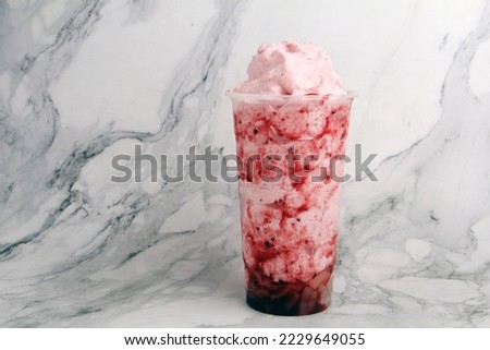 Photo of freshly made strawberry flavored frappe. Royalty-Free Stock Photo #2229649055