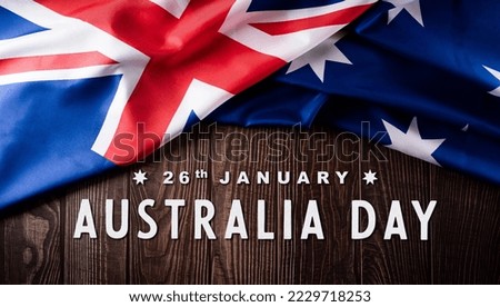 Happy Australia day concept. Australian flag against old wooden background. 26 January.