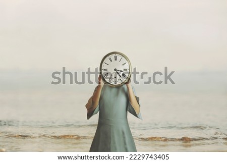 surreal woman with clock in place of face checks time pass Royalty-Free Stock Photo #2229743405