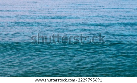 Abstract nature background Sea rippled water surface texture edge wallpaper blue green turquoise