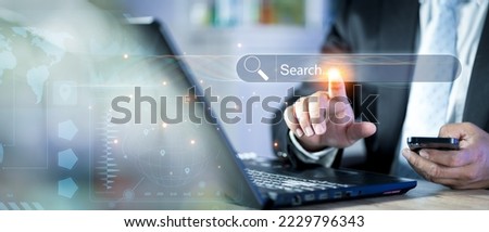 Searching information data on internet networking concept. Searching Browsing Internet Data Information with blank search bar. businessman working with clicking internet search page on computer..