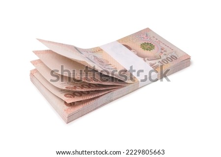 New Thai Banknote 1000 baht stacking isolated on white background. This has clipping path . ( Photo stacking full depth field focus full sharpen) Royalty-Free Stock Photo #2229805663