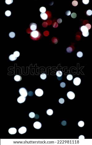 Christmas circle lights background isolated on black. 
