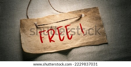 Close up conceptual shot of a business idea showing Free